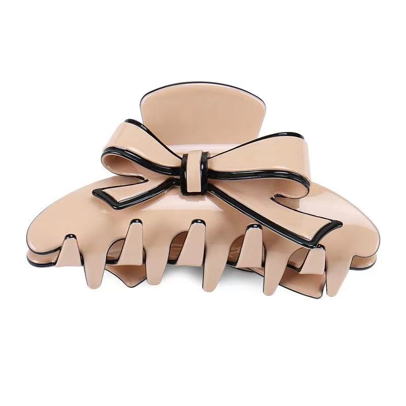 Dancing butterfly Claw clip within Lightpink