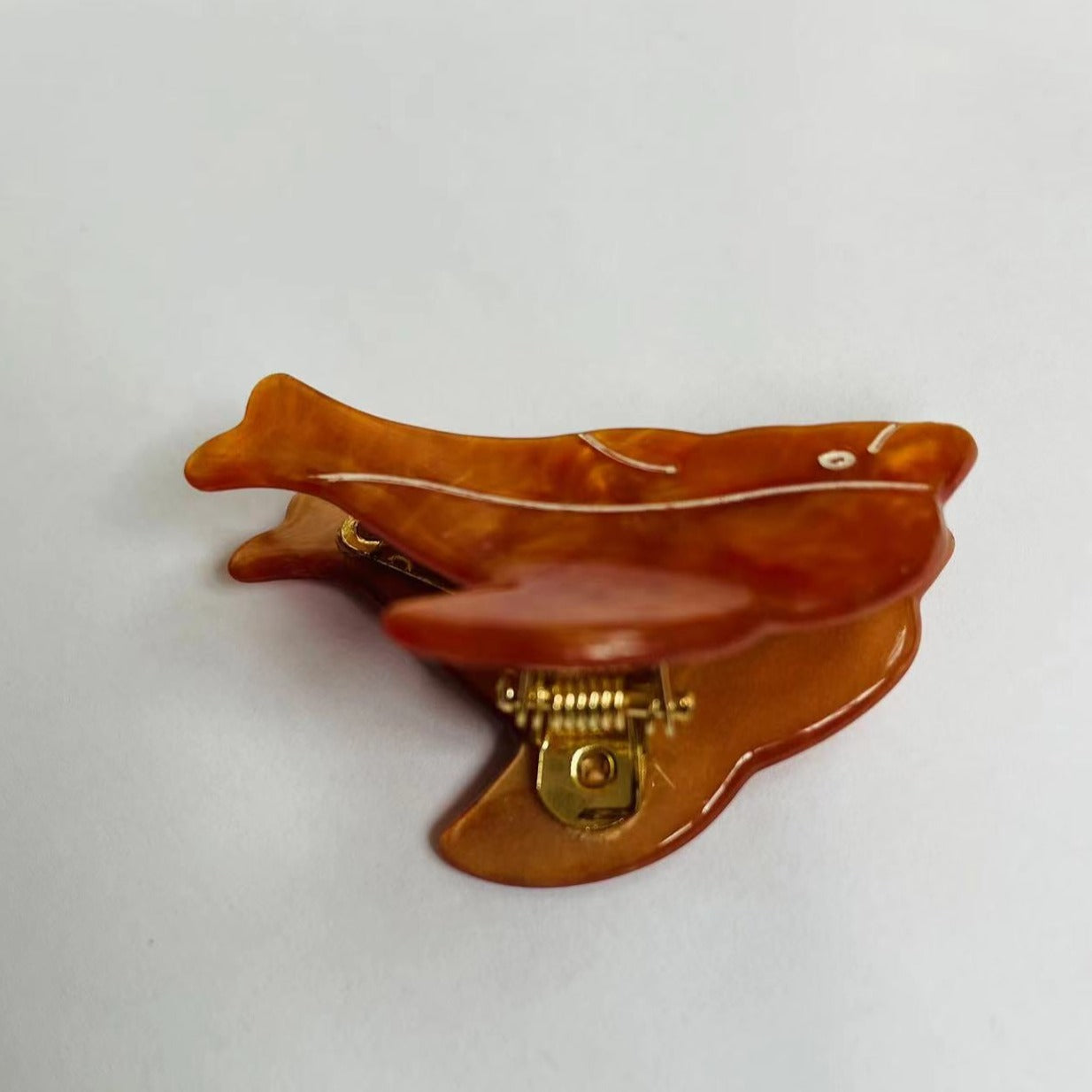 dolphin Mini Claw within Orange