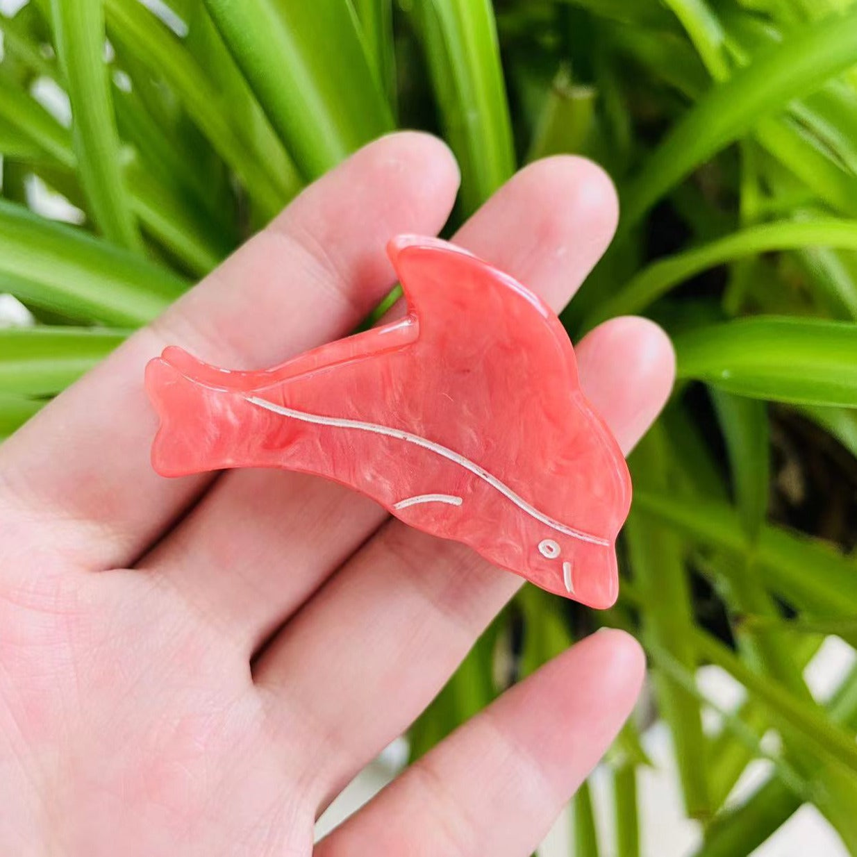 dolphin Mini Claw within peach