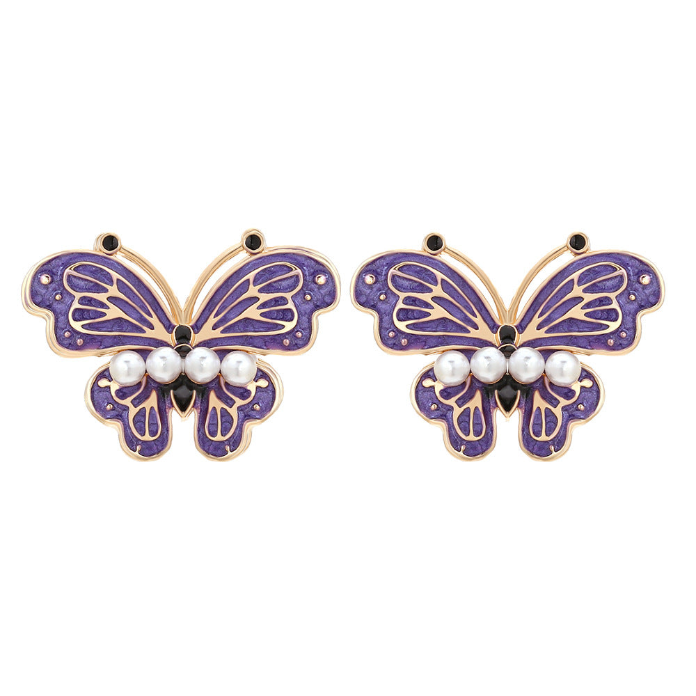 Enamel butterfly earrings within colorful