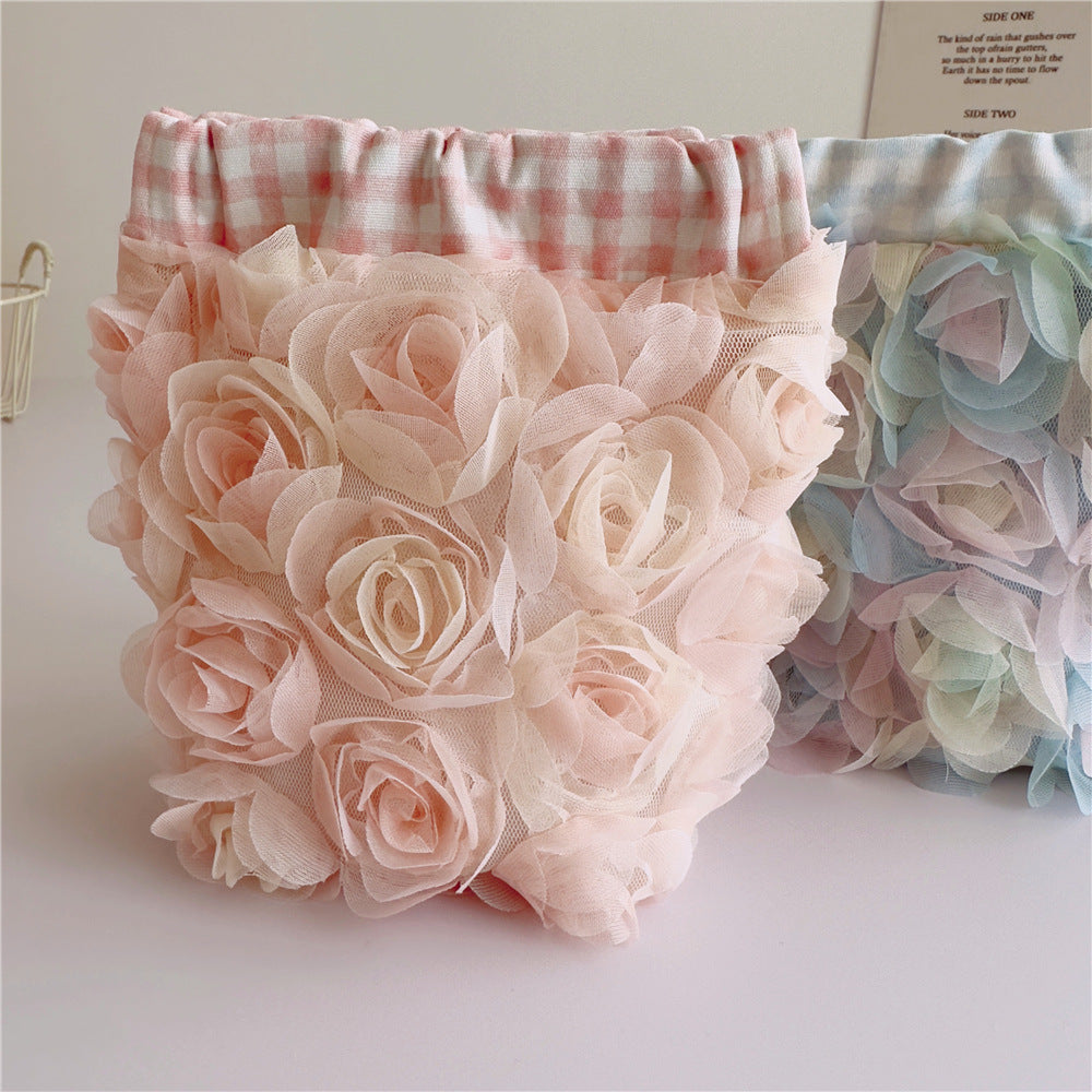 Rose Cosmetic Bag within blue