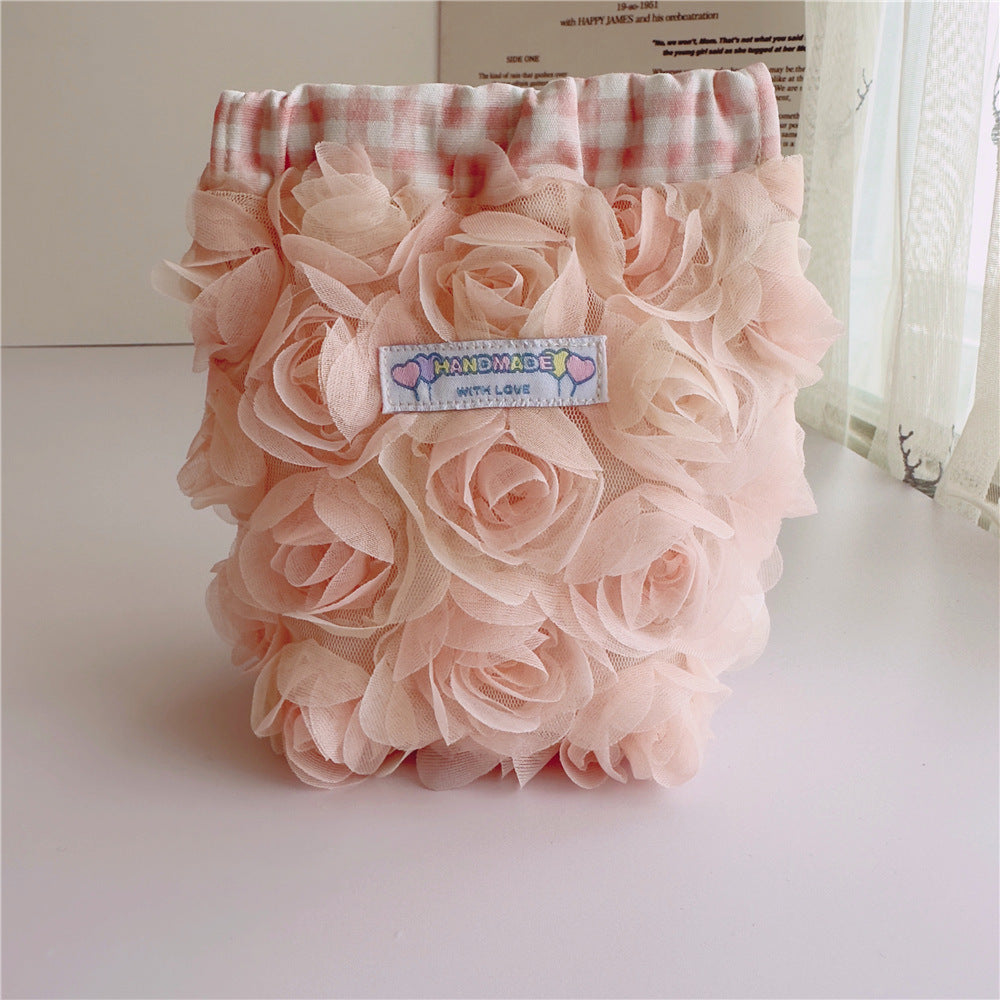 Rose Cosmetic Bag within blue