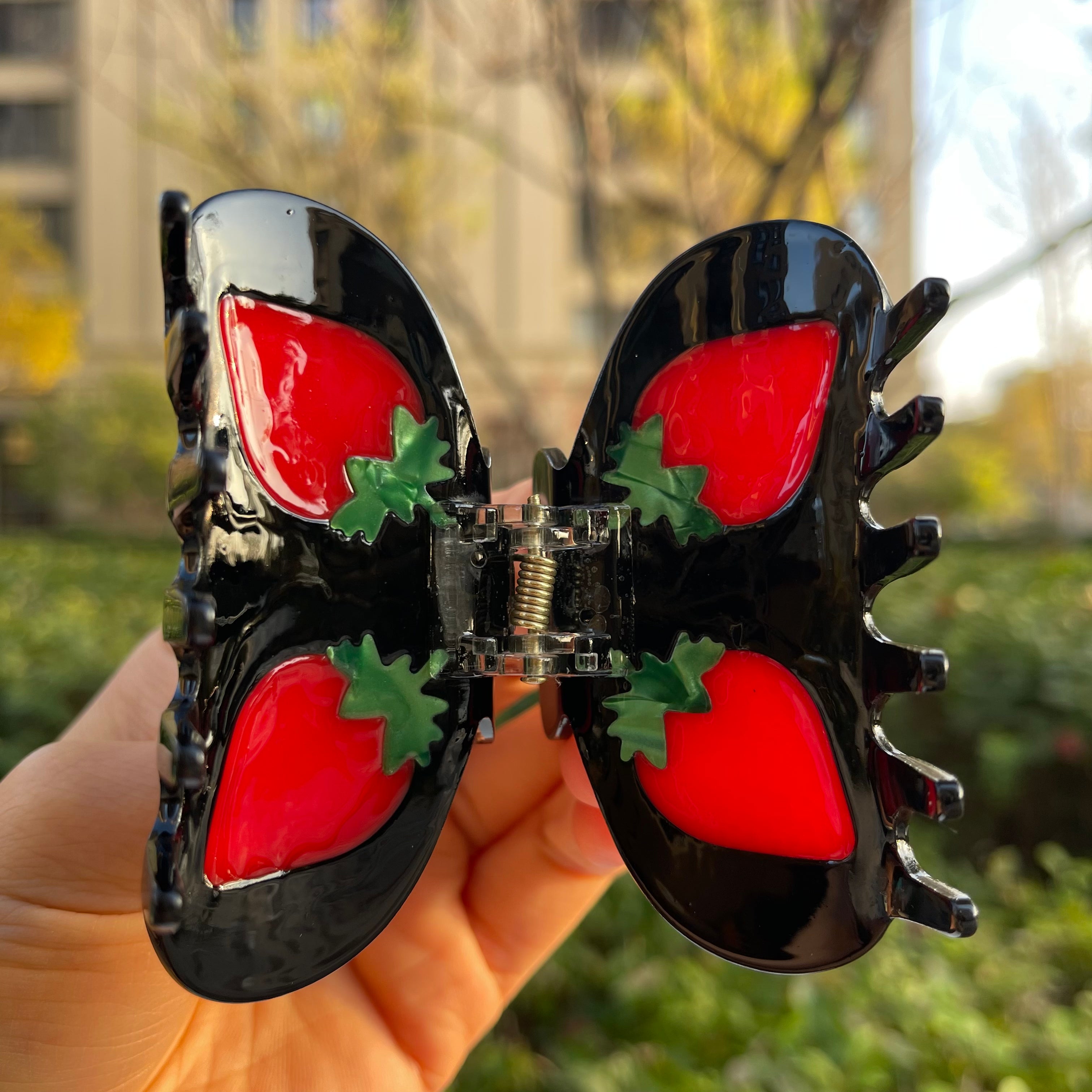 Strawberry hair claw within black