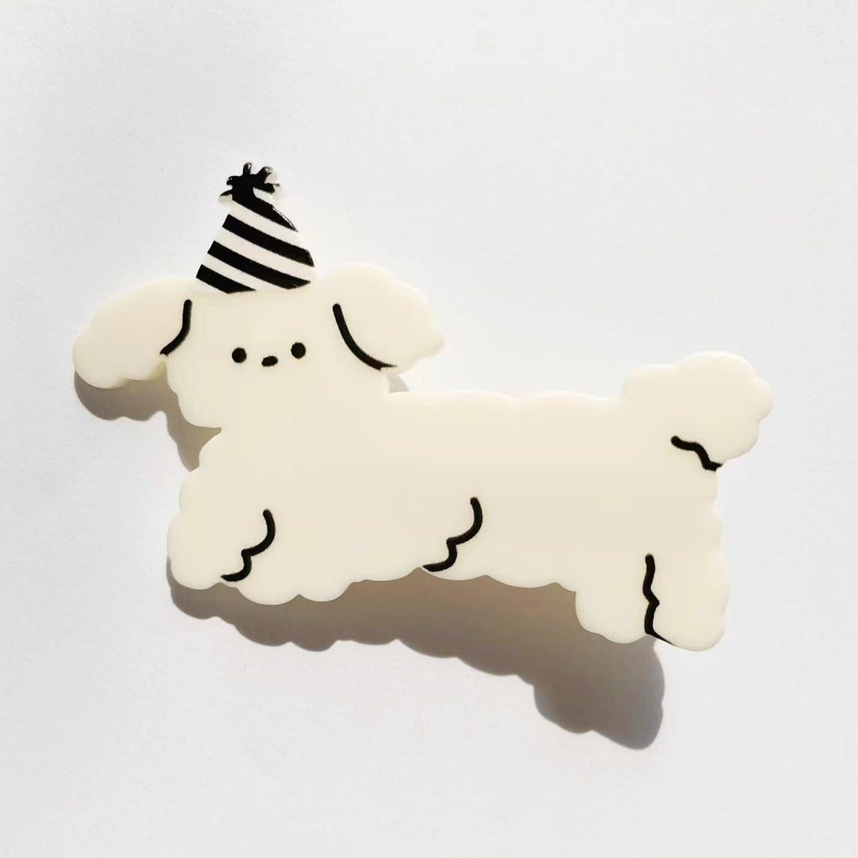 White dog with dress hat clip