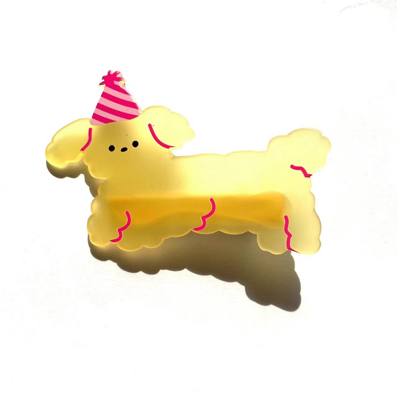 Yellow dog with dress hat clip