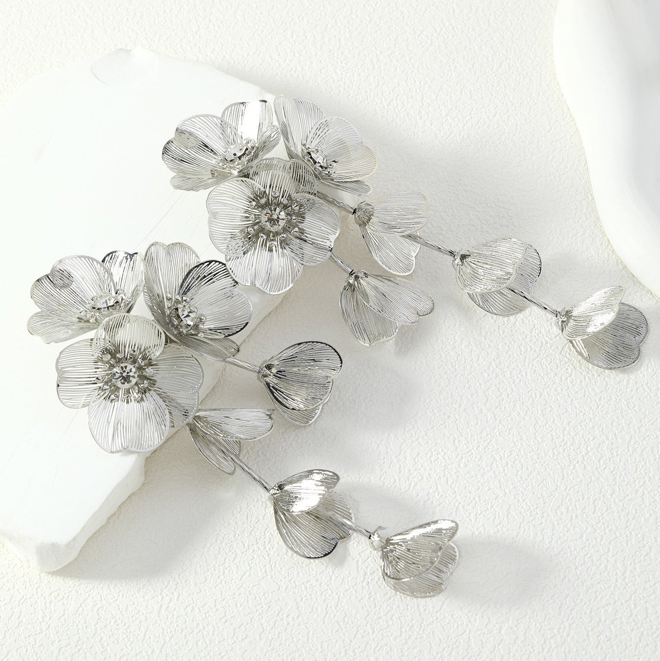 Silver woven flower earrings