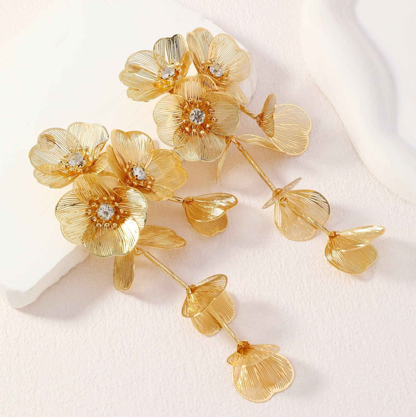 Golden woven flower earrings