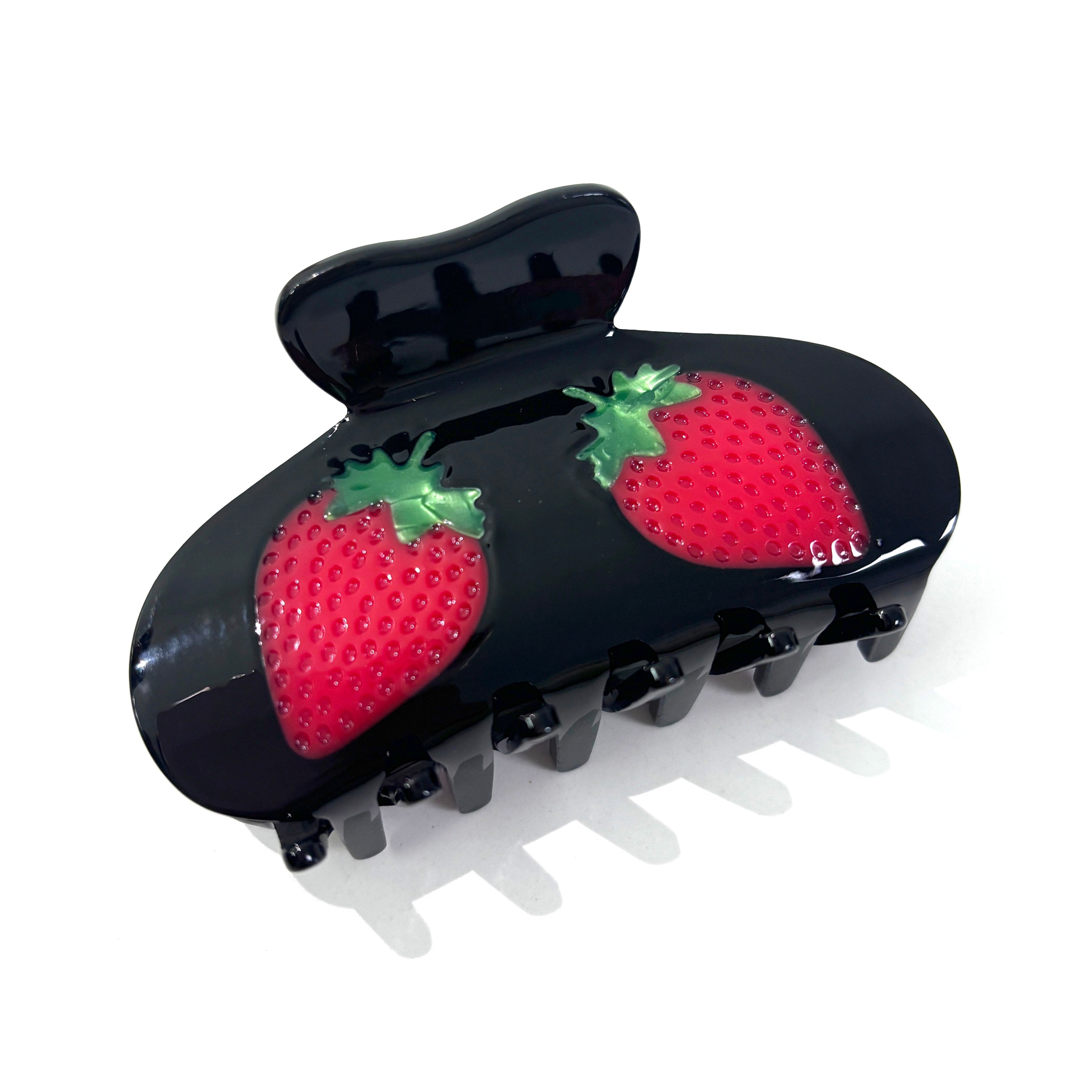 Strawberry hair claw within black