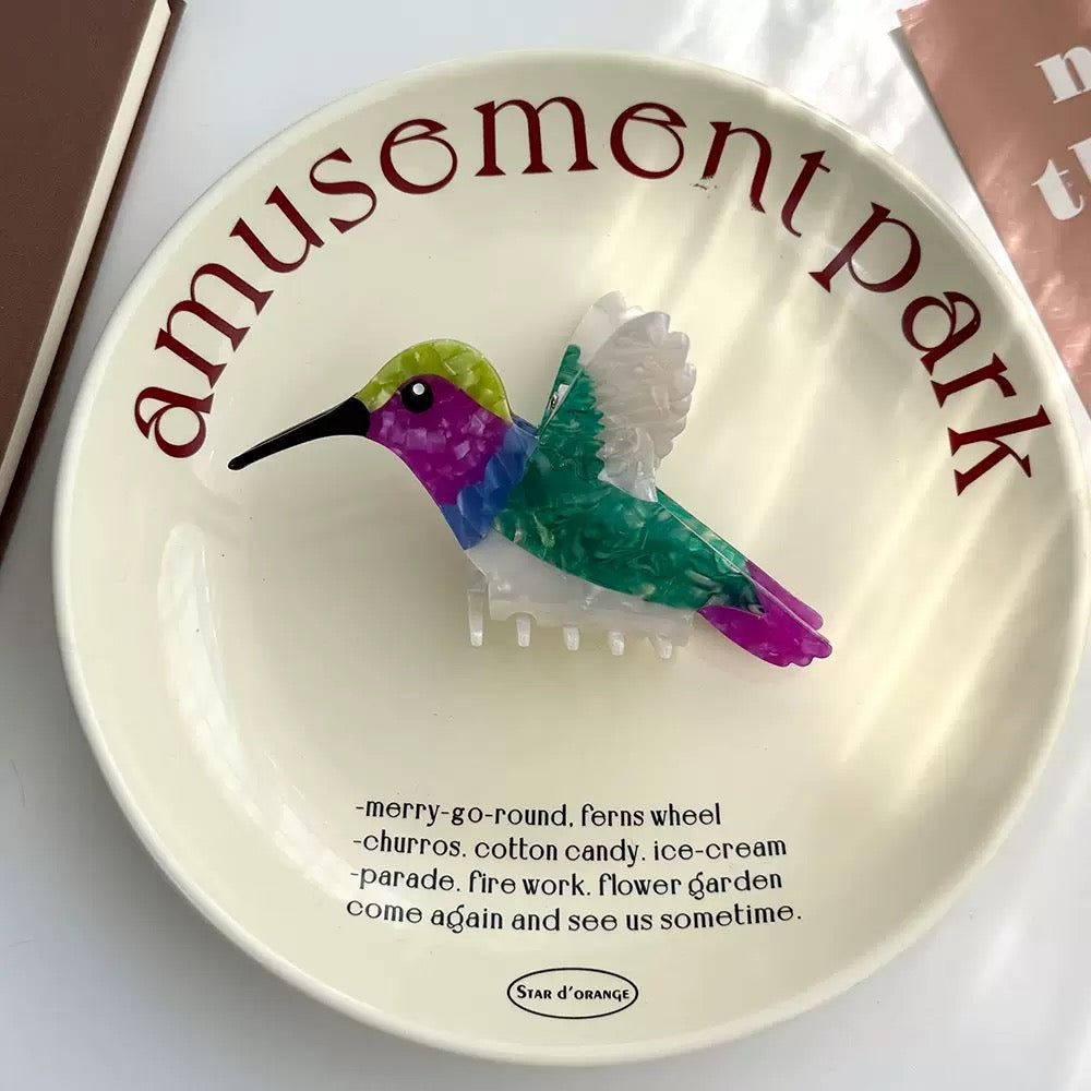 Small Hummingbird Clip within green