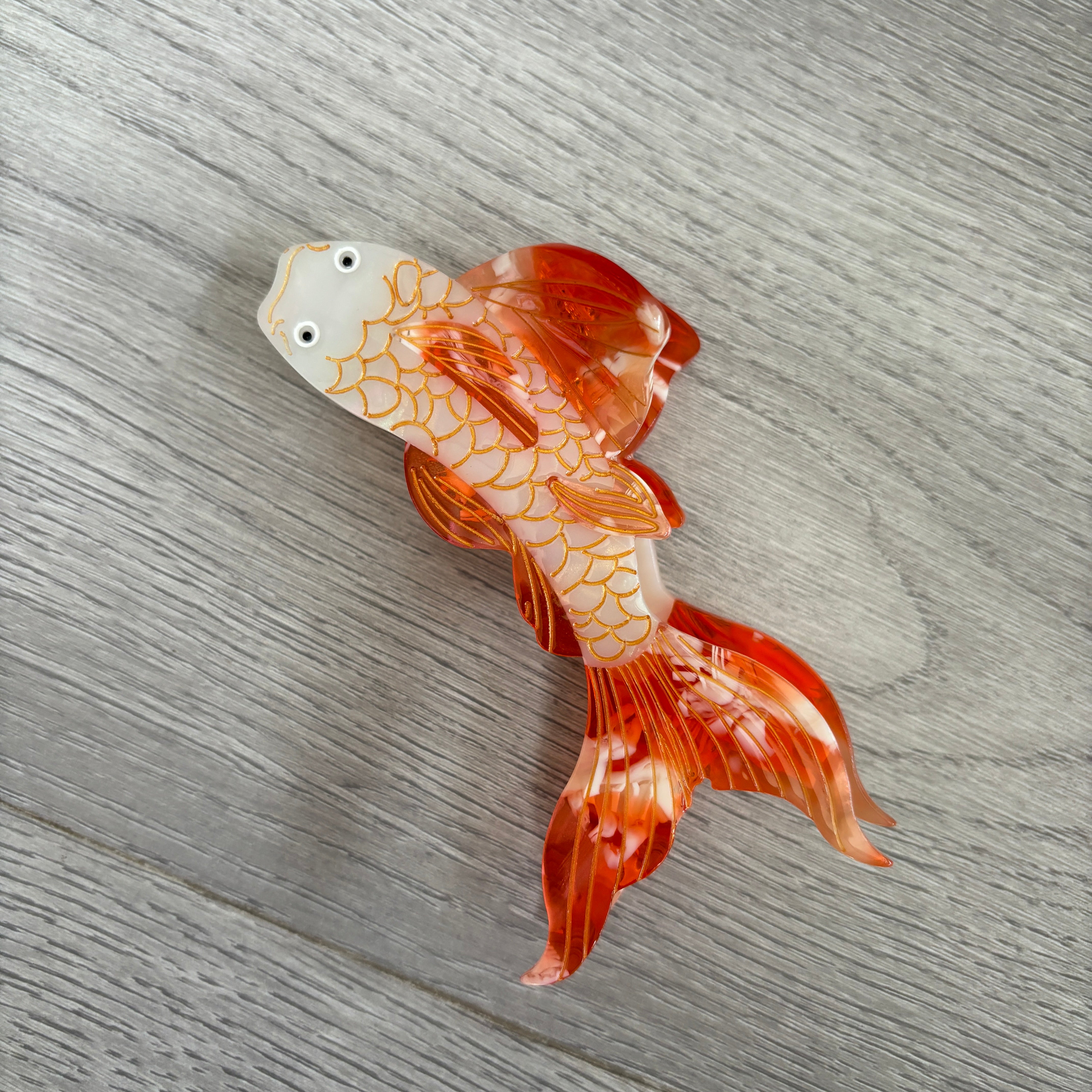 Yellow and white koi hair claw