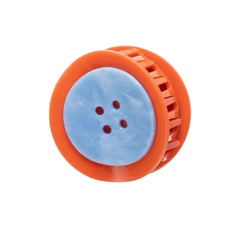Orange button claw