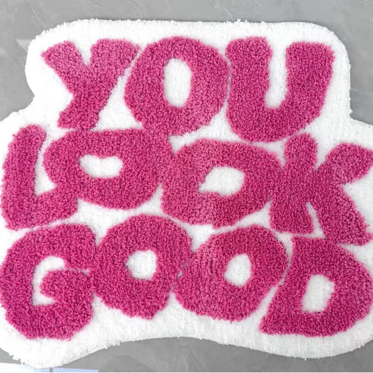 You look good within pink rug