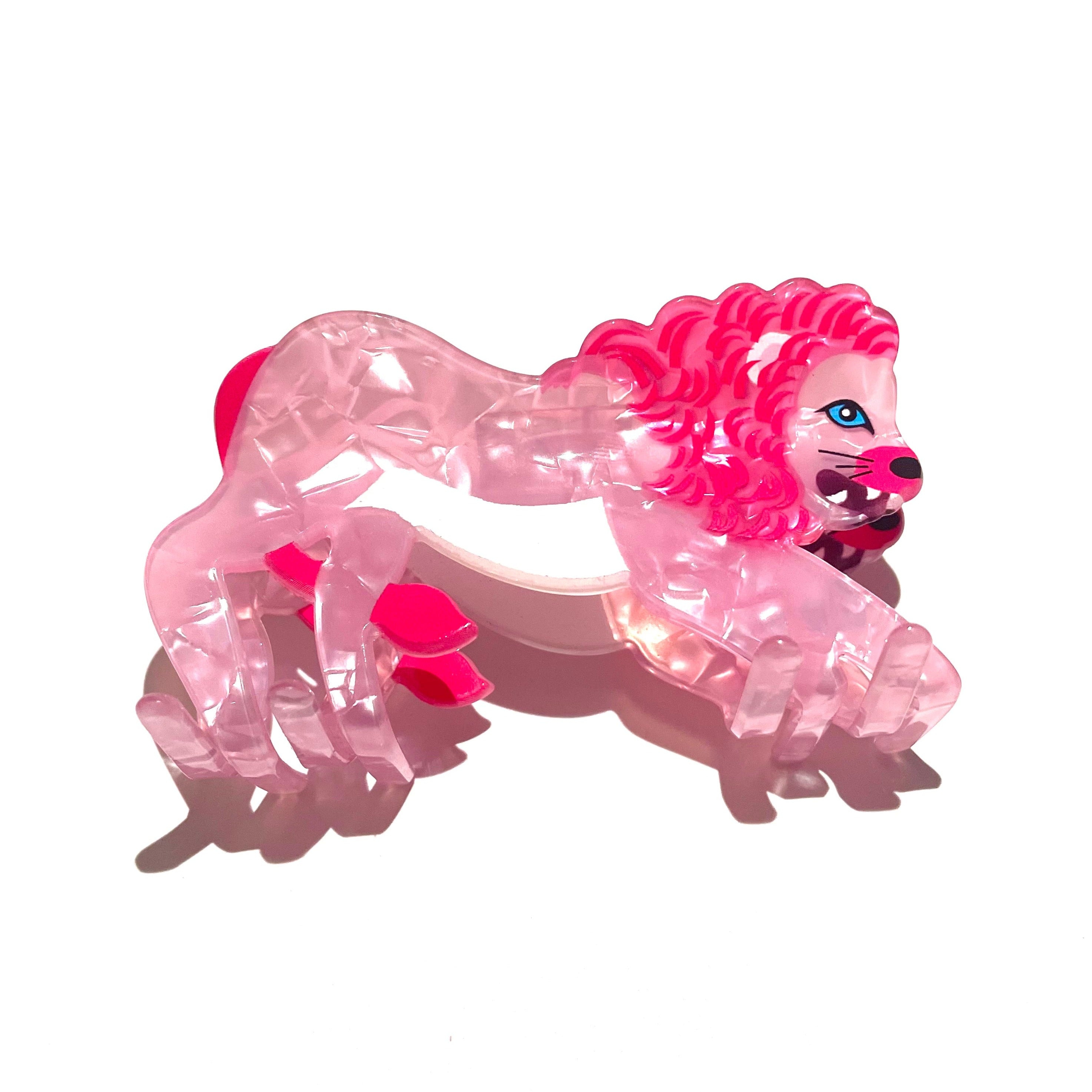 Hungry lion claw within pink