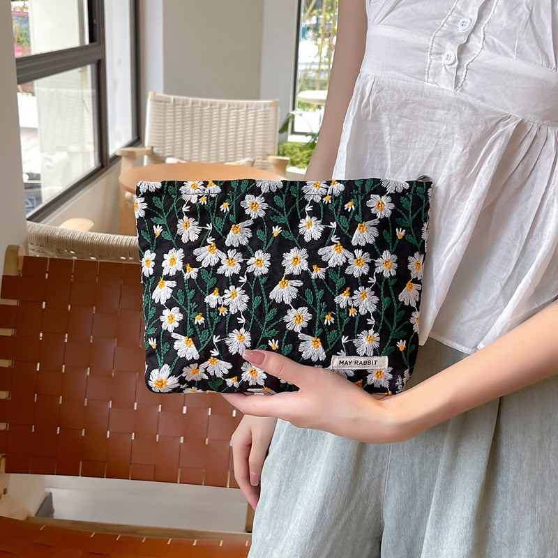 White Daisy Makeup Bag within Black